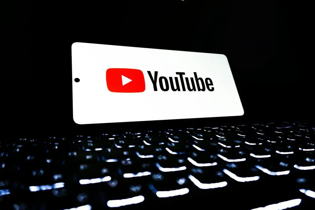 Youtube symbol behind keyboard on the screen